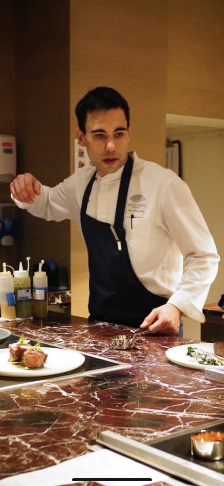 Plating at the marble chef's counter